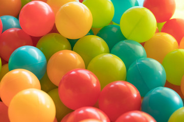 Bright and Colorful toy balls, kids ball pit background, softpla