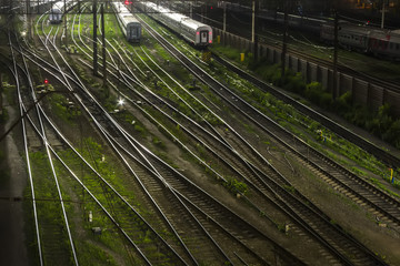 Naklejka na ściany i meble trains in railway junction at night