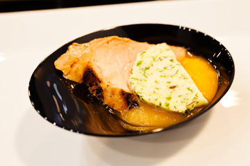 decorated with a piece of salmon on a plate