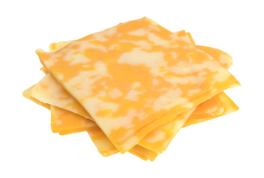 Slices of Colby-Jack cheese on a white background.