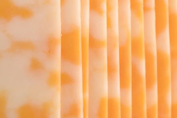 Close view of Colby-Jack cheese slices.