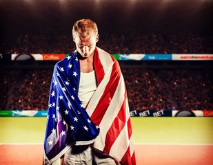 Composite image of athlete with american flag