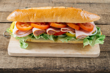 Food series : Baguette ham sandwich on wooden board