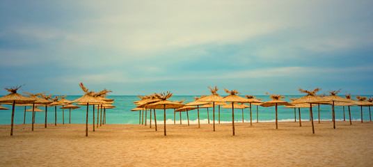 Summer background on the beach. Artistic image with colored filter.