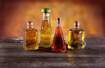 bottles of oil with aromas of sage rosemary and chilli
