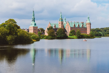 Frederiksborg castle reflected in the lake in Hillerod.