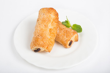 Baked sticks on a white plate