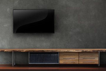 Living room led tv on concrete wall with wooden table media furn