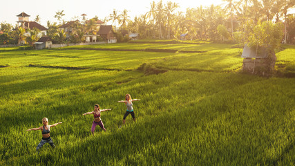 Women doing yoga in outdoors