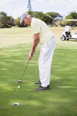 Full length of man playing golf