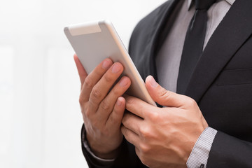 Businessman holding tablet