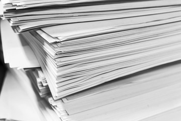 pile of document on desk
