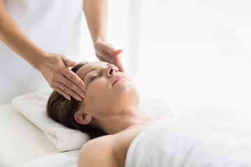 Fototapeta na wymiar Masseur massaging woman