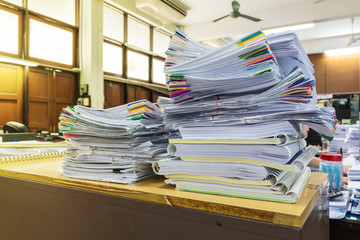 pile of document on desk
