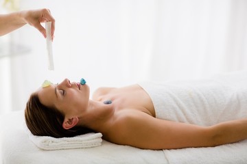 Obraz na płótnie Canvas Relaxed woman receiving massage treatment