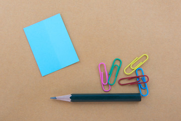 Color  Paper notes with sticky note on brown Background