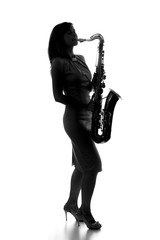 silhouette of a woman with a saxophone