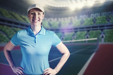 Composite image of sportswoman posing on black background