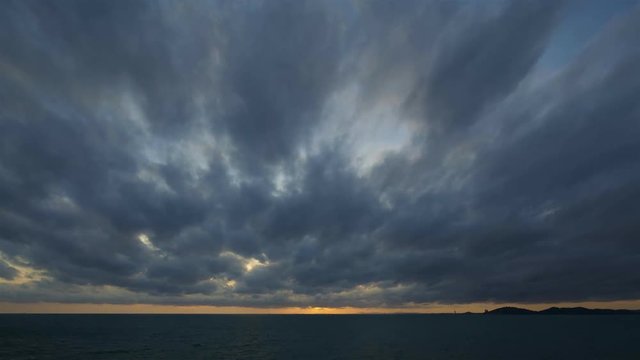 rain cloud before raining over the sea at sunset time lapse from tilt shift lens, 4K, Full HD, 3840 x 2160