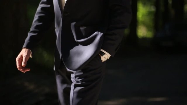 groom in wedding suit