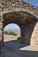 Stone arch to the countryside  in Marvao, Portugal