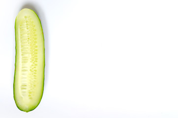 Sliced ​​cucumber on a white background