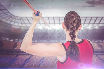 Composite image of female athlete throwing a javelin