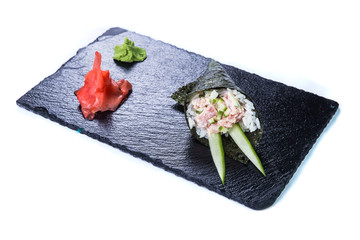 Sushi Set  and sushi rolls on black stone slate. Restaurant food concept.