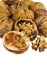 Walnuts Isolated on White Background..Crushed nutshell with opened nuts cores.