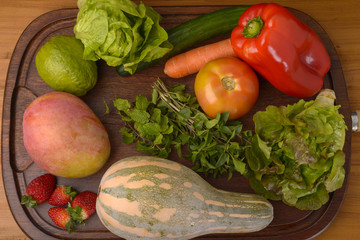 Fruits and Vegetables on Wooden Board