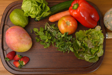 Fruits and Vegetables on Wooden Board