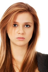 Naklejka premium Sad or worried teenage pretty woman 