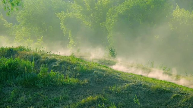 extreme sports motocross motorcycle jumping on a race on high speed rail amped through mud super slow motion racers fly over jump freestyle stunt