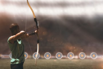 Rear view of sportsman doing archery