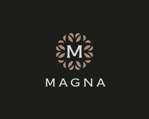 Premium monogram letter M initials logo. Universal symbol icon vector design. Luxury abc leaf logotype.