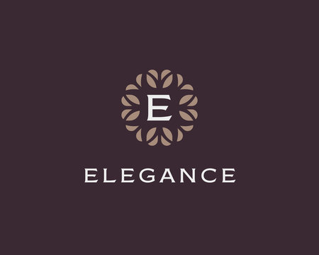 Premium monogram letter E initials logo. Universal symbol icon vector design. Luxury abc leaf logotype.