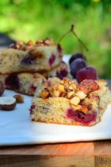 piece of cake with cherries and nuts 