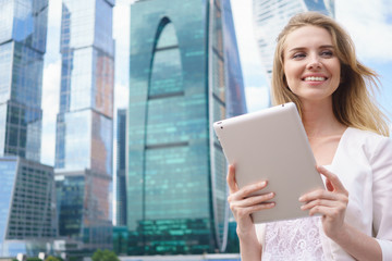 Fototapeta premium Young beautiful woman with tablet pc