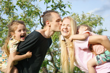 Portrait of a happy family outdoors