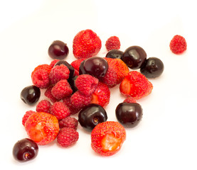 Pile of fresh berries, raspberries, strawberries, cherries
