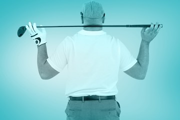 Composite image of rear view of golf player holding a golf club