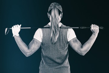 Composite image of pretty blonde playing golf