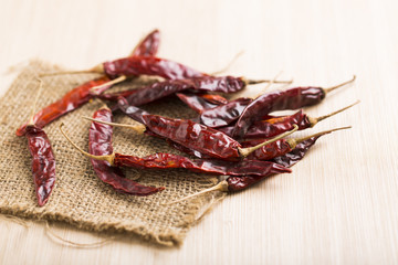 Red chilli on wood table