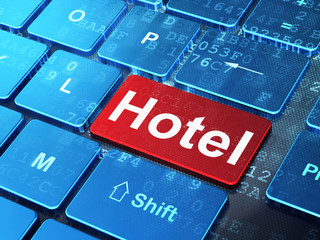 Vacation concept: Hotel on computer keyboard background