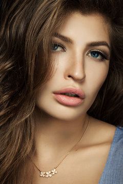 close-up portrait of a beautiful girl with big lips and blue eye