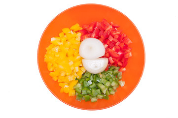 Shredded bell pepper and onion in bowl isolated on white. Three