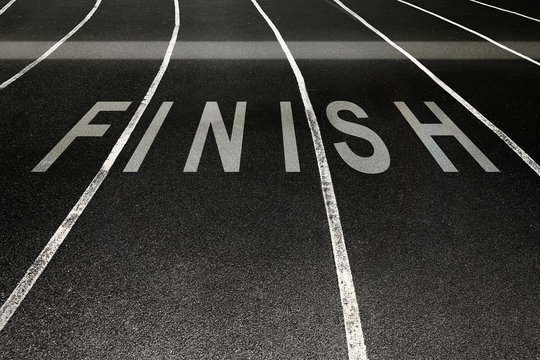 Finish written on running track