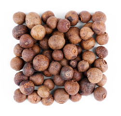 Square of allspice on white background