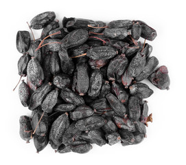 Square of dried barberry on white background