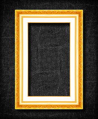 gold frame on black slate background